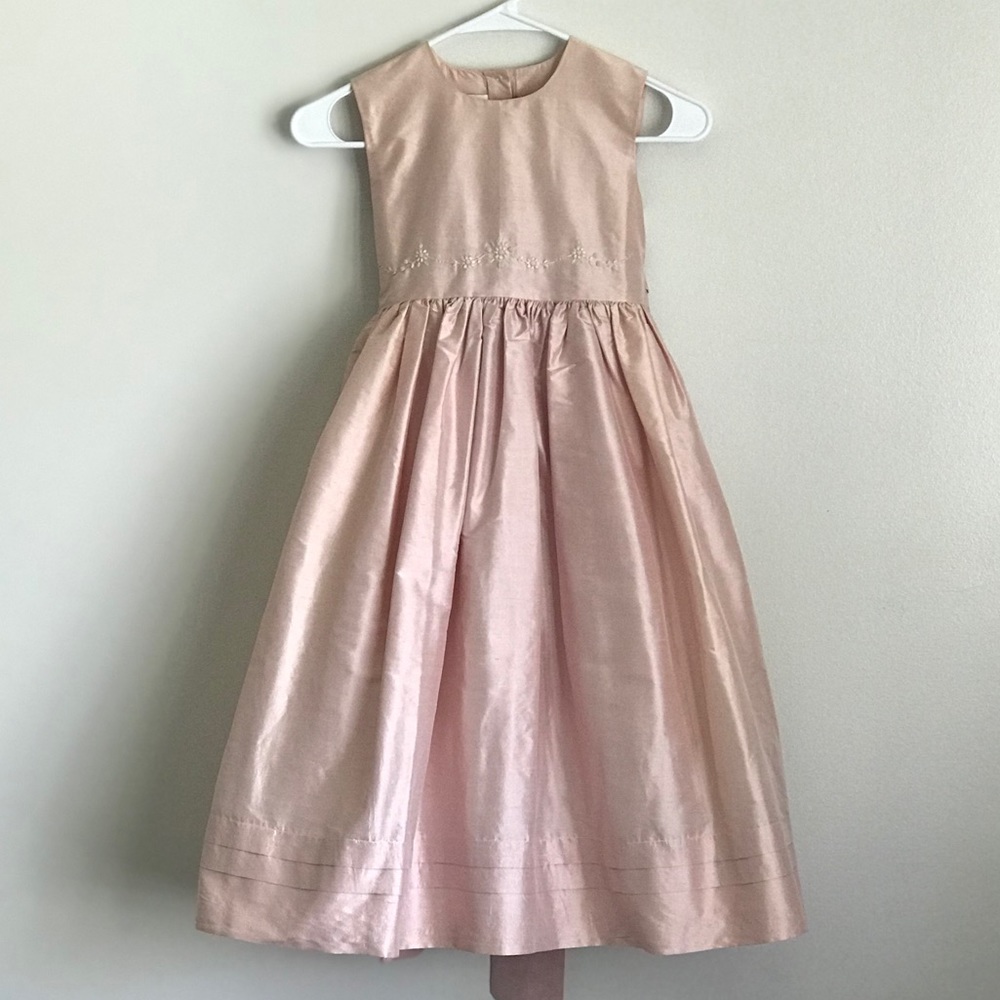 Elegant, simple and stylish little girls gown.